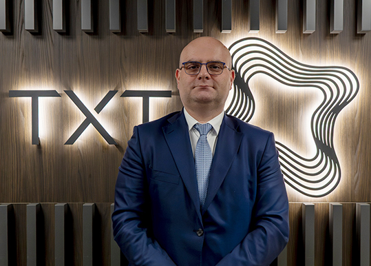 TXT Industrial acquisizione FasThink trasformazione digitale logistica Mirco Mariani